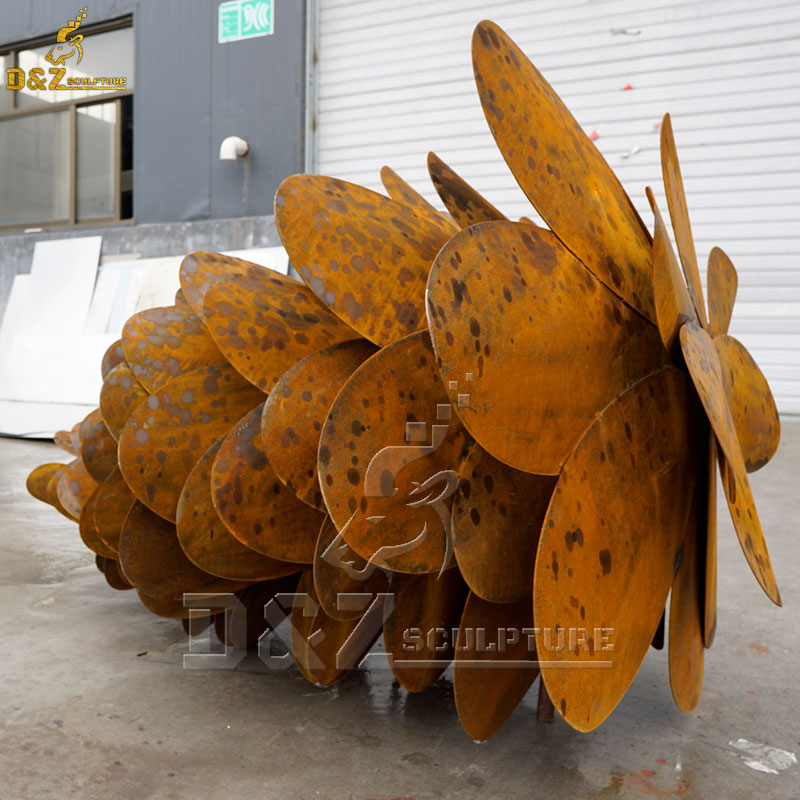 large metal pine cones