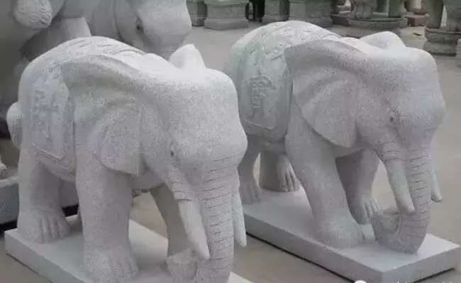 A pair of elephant sculptures