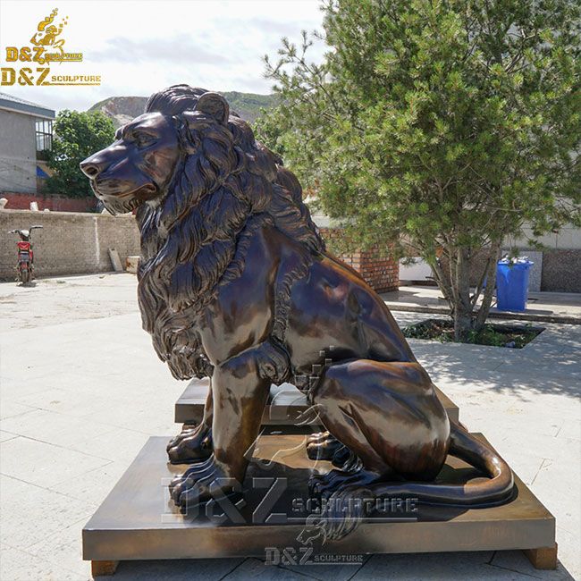 sitting lion garden statue