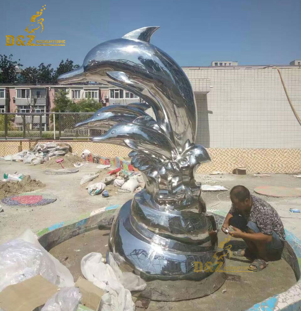 metal dolphin sculpture