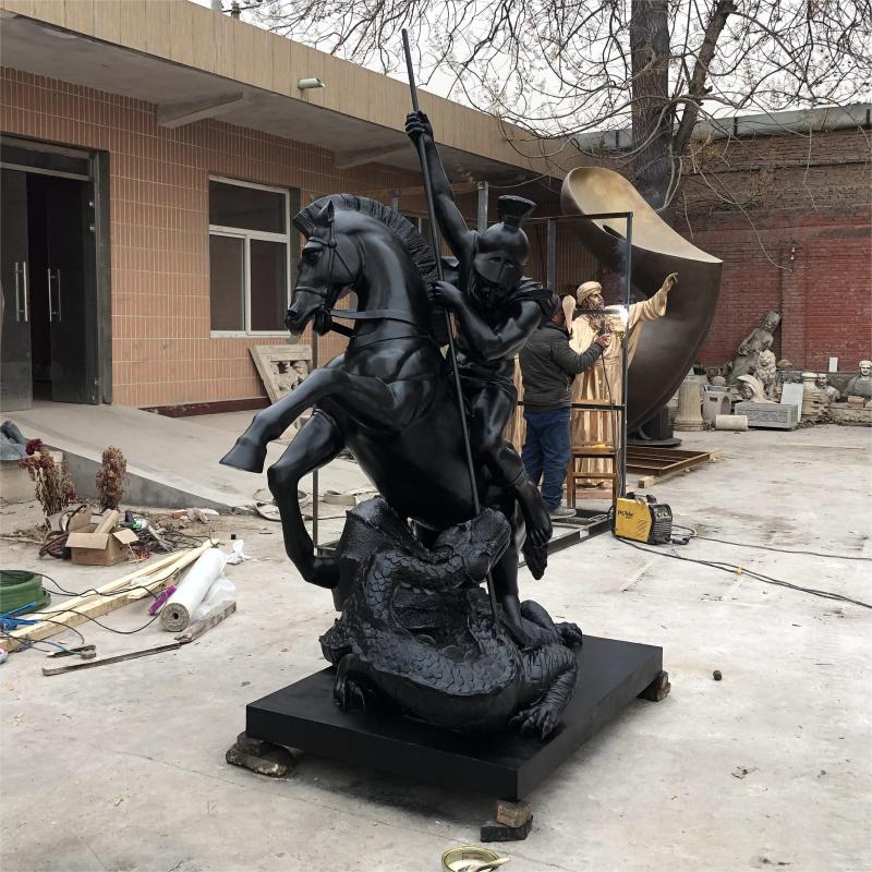 Custom bronze statue of Saint George slaying the dragon