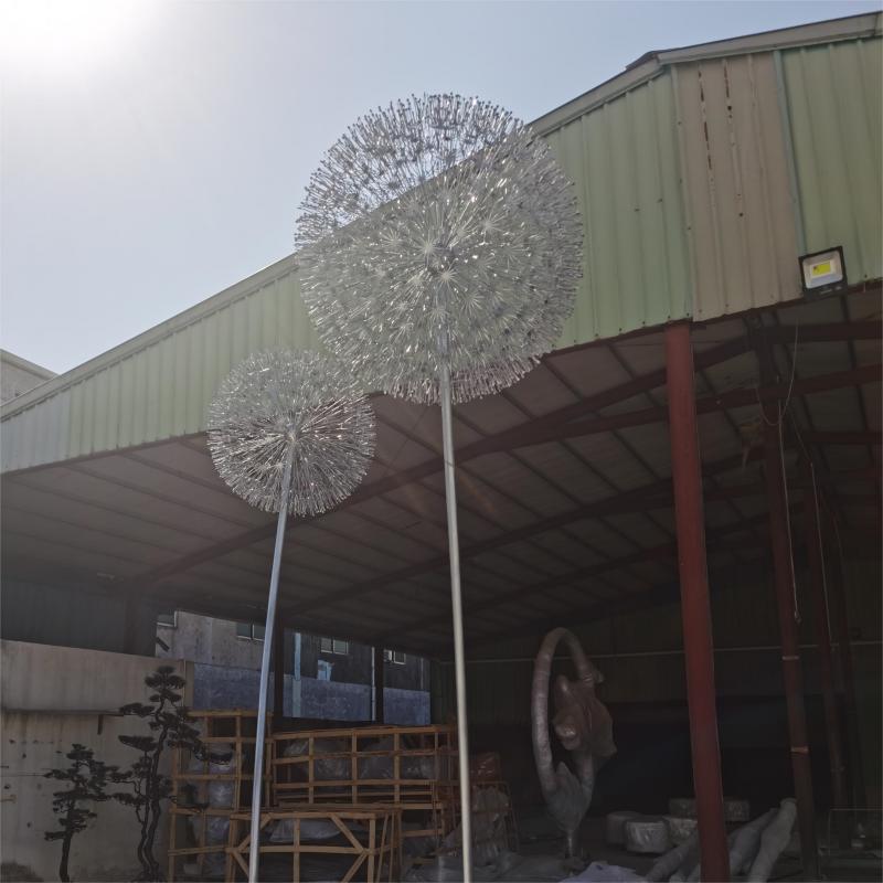 What is the symbolic meaning of the dandelion sculpture? Garden metal dandelion art sculpture for sale