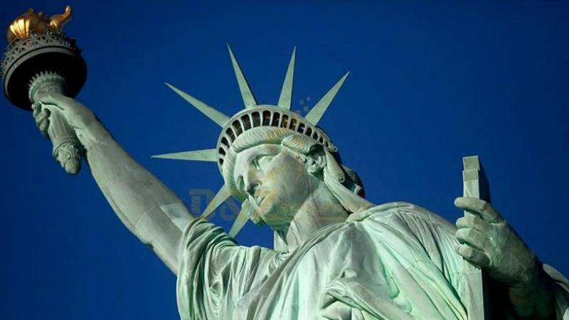 What is the original color of the Statue of Liberty in New York and what does it represent?cid=3