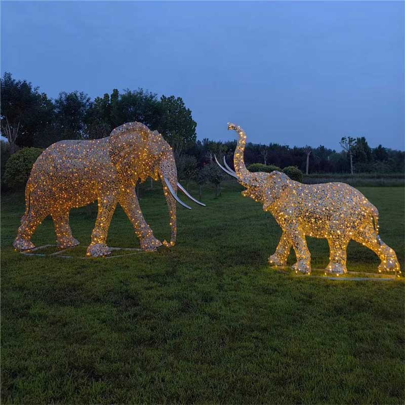 Stainless steel hollow art elephant family sculptures with LED lighting system, suitable for festival celebrations DZ-226