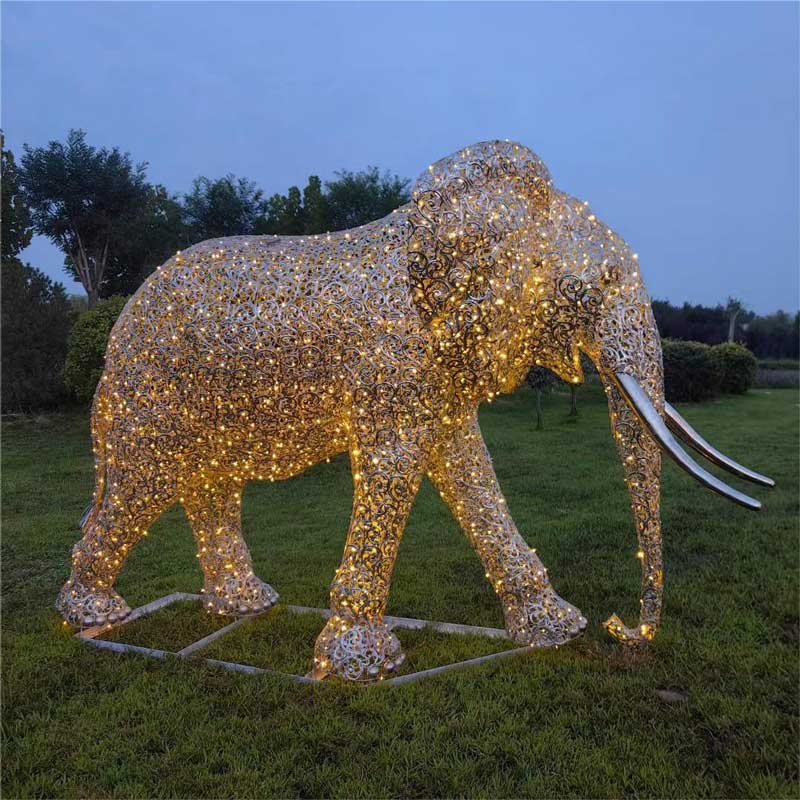 Stainless steel hollow art elephant family sculptures with LED lighting system, suitable for festival celebrations DZ-226