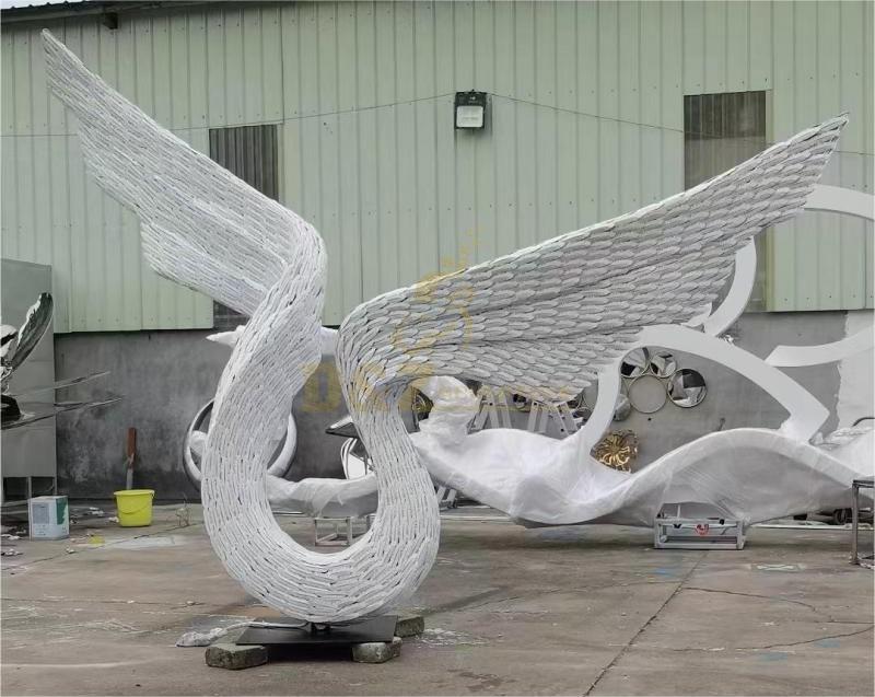 Large outdoor public sculpture metal wing sculpture