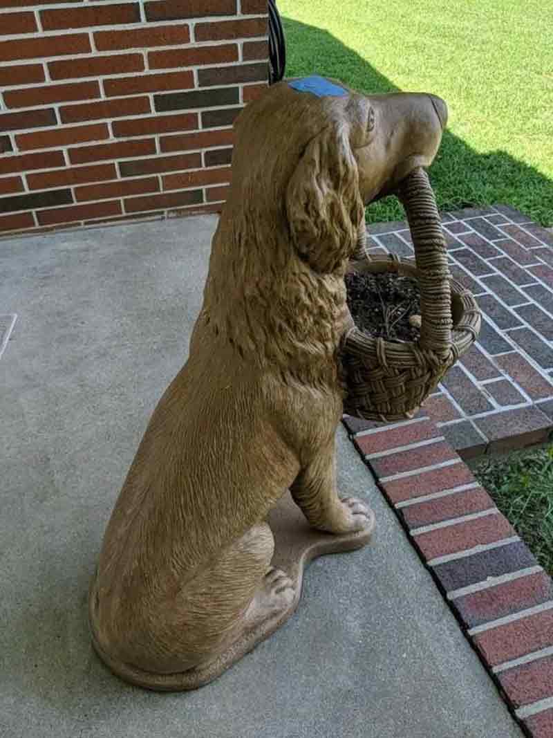 Life size bronze dog with basket garden statue for front porch