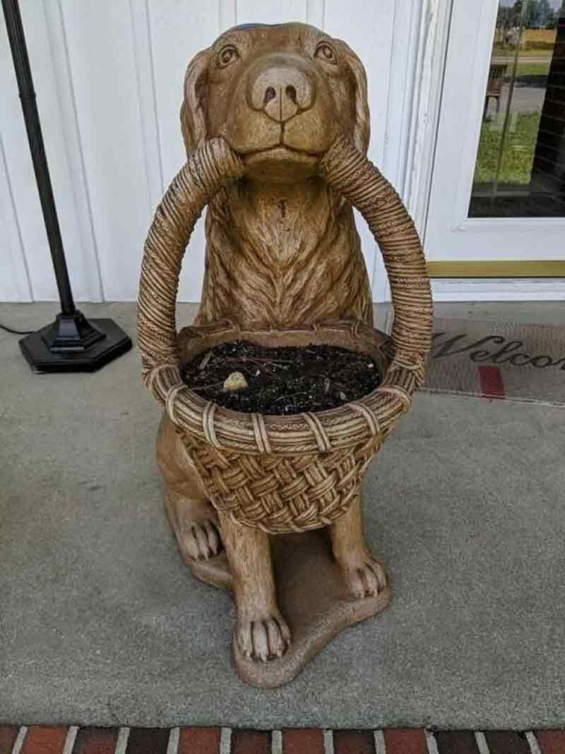 Life size bronze dog with basket garden statue for front porch