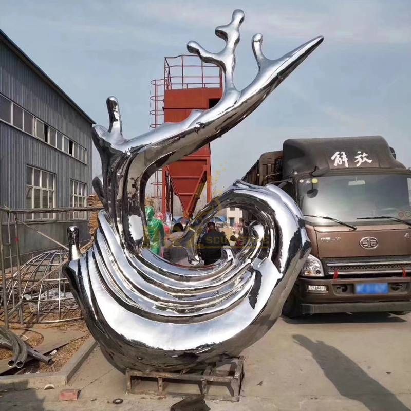 Large metal stainless steel water spray statue