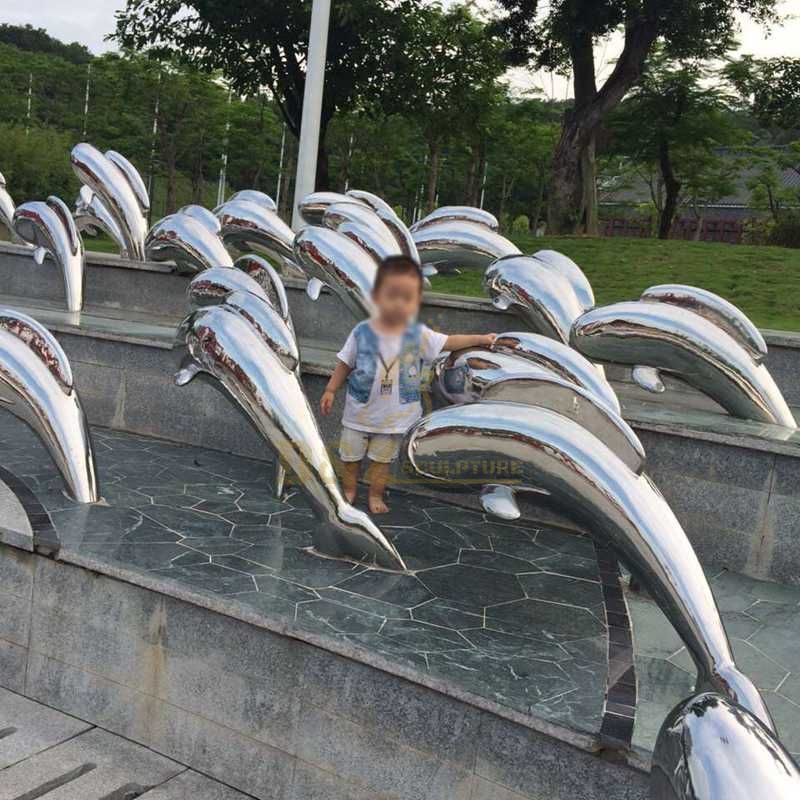 Stainless steel dolphin fountain sculpture