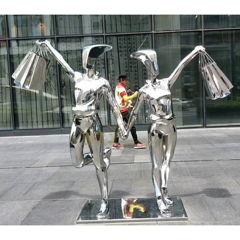 Large stainless steel golden wings sculpture