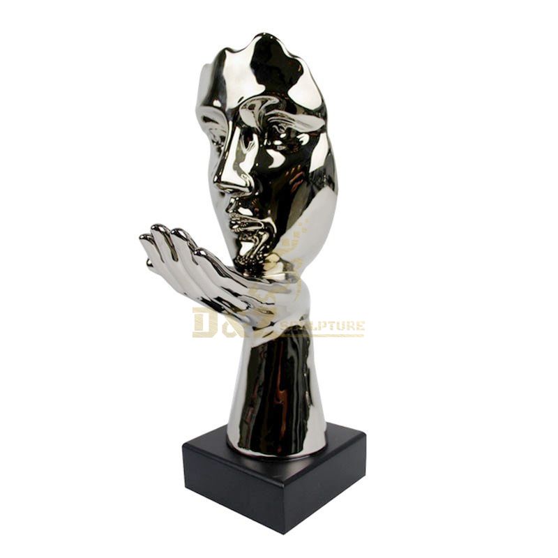 Stainless steel with hand on chin figure sculpture