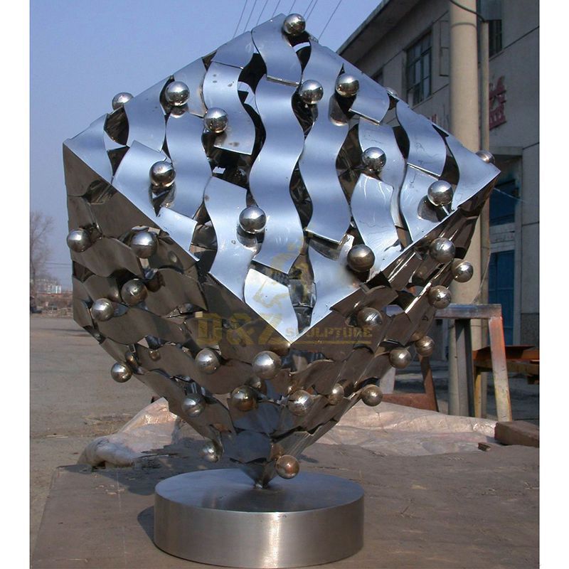 Large stainless steel pipe welding car sculpture
