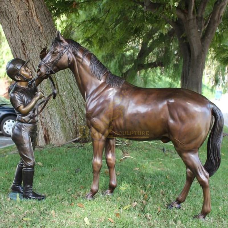 Garden life-size cast bronze boy with horse statue