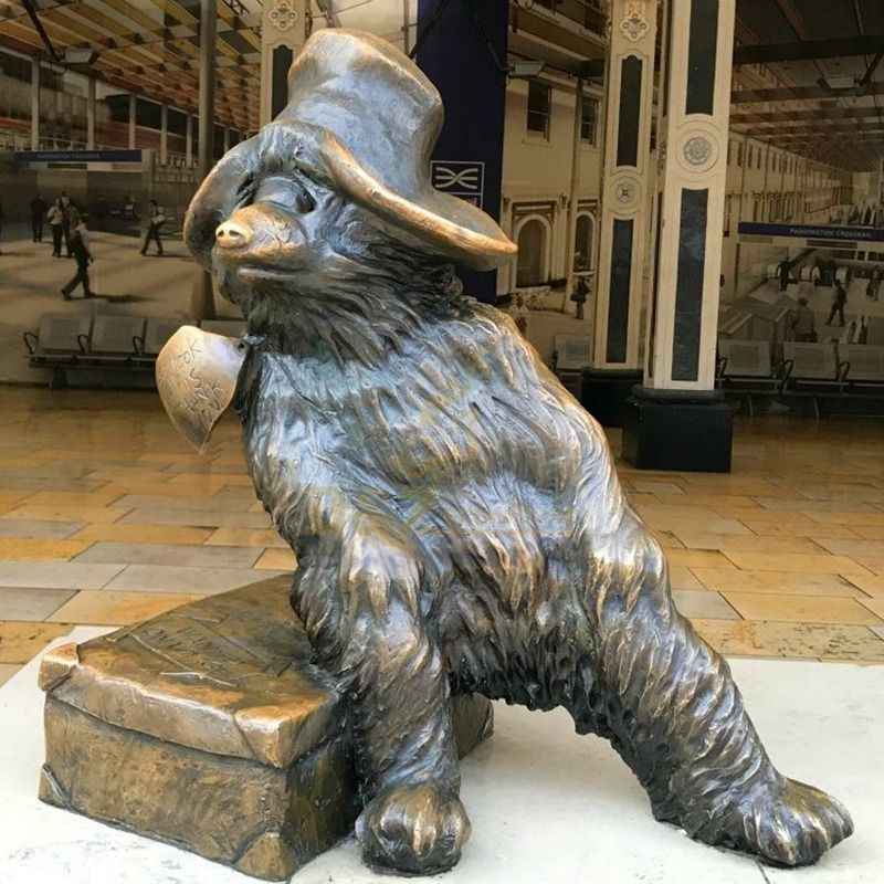Outdoor sitting bronze bear sculpture