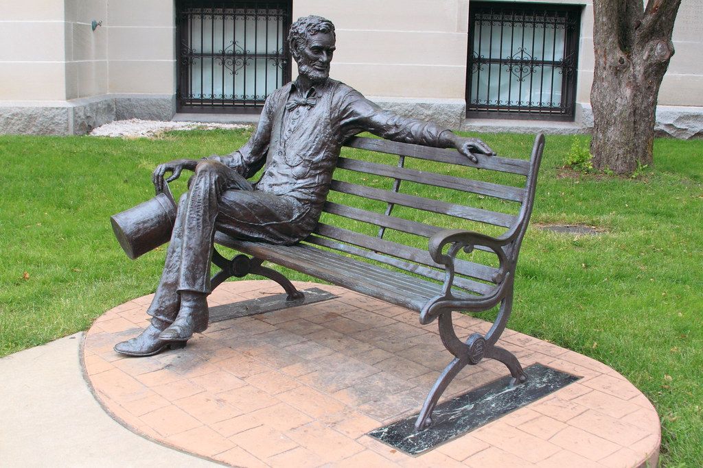 The streets decoration bronze statue sitting man on bench sculpture