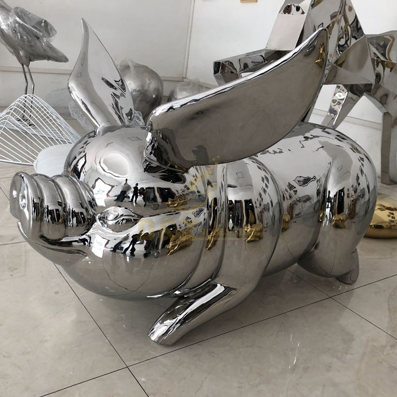 Shiny smooth metal stainless steel mirror pig sculpture