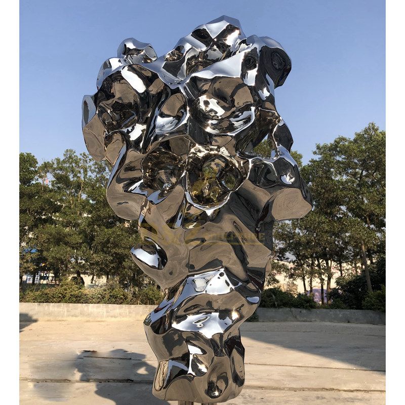 Abstract mirror geometric polished stainless steel sculpture