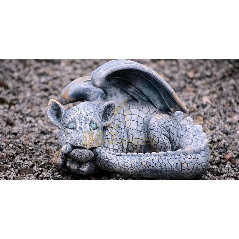 Sleeping baby dragon garden statue