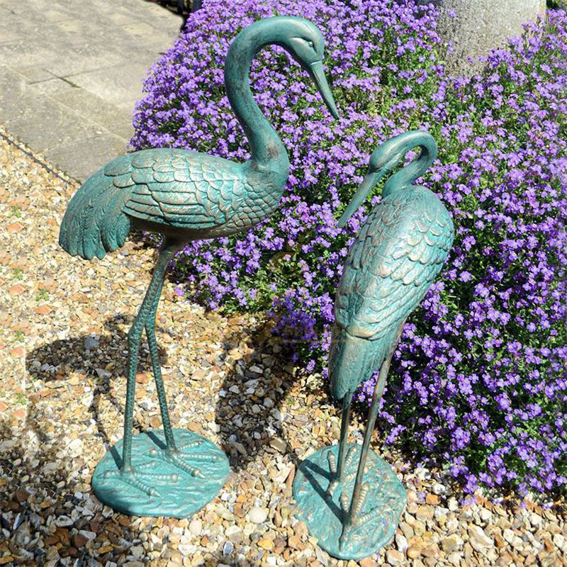 crane garden statues