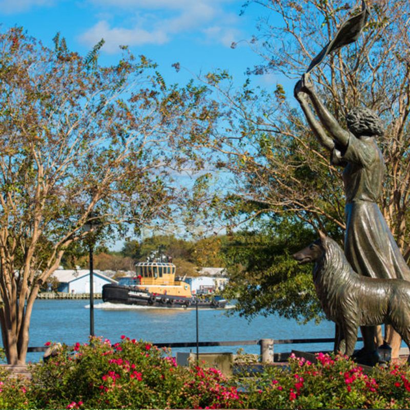 metal waving girl statue