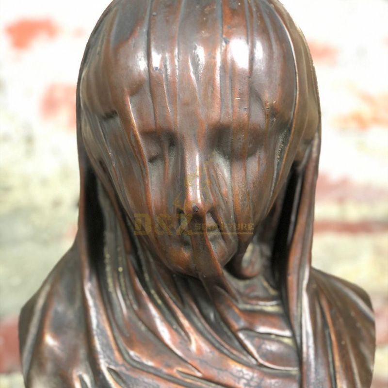 Bronze bust of a veiled woman statue