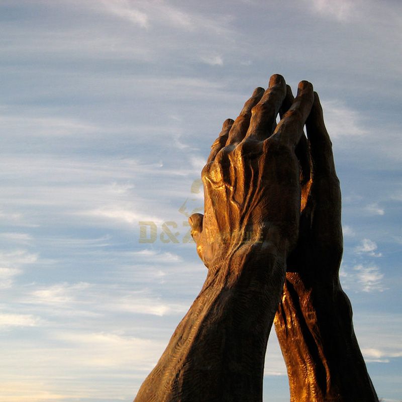 praying hands garden statue