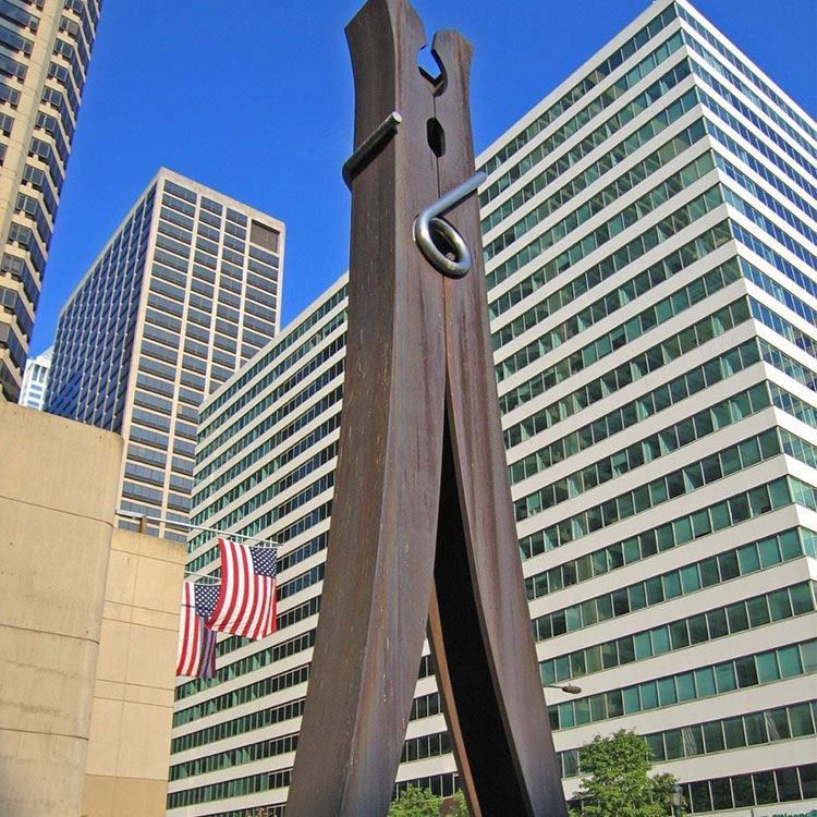 outdoor giant clothespin sculpture garden decor