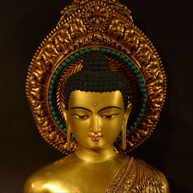 gold buddha head statue