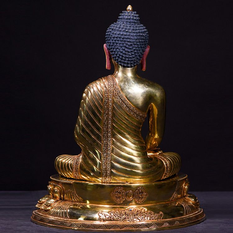 brass buddha statue