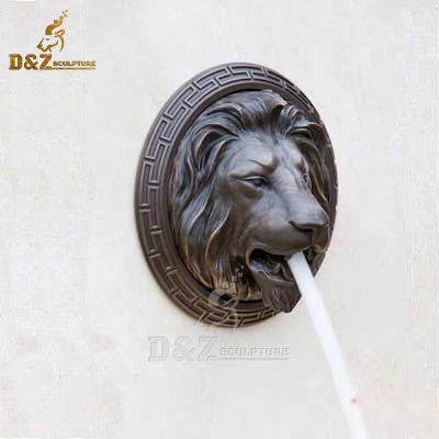 Bronze lion head wall water fountain spout outdoor