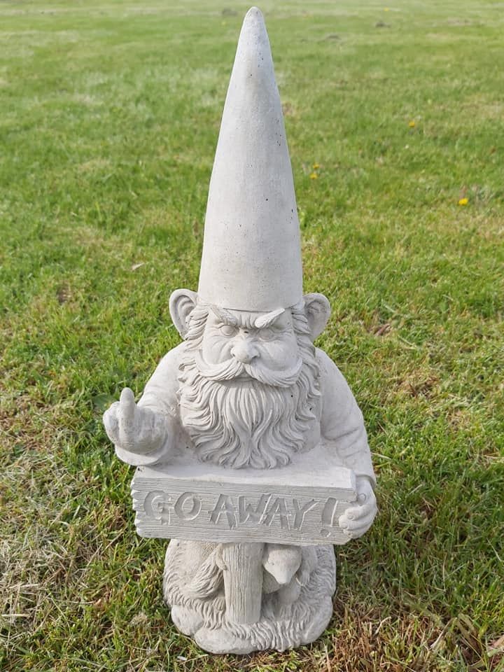 garden gnome with go away sign