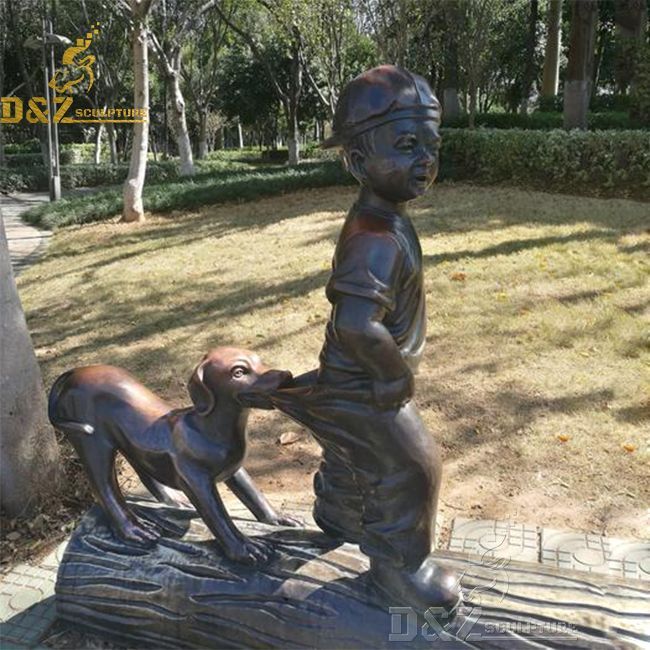 boy and his dog garden statue