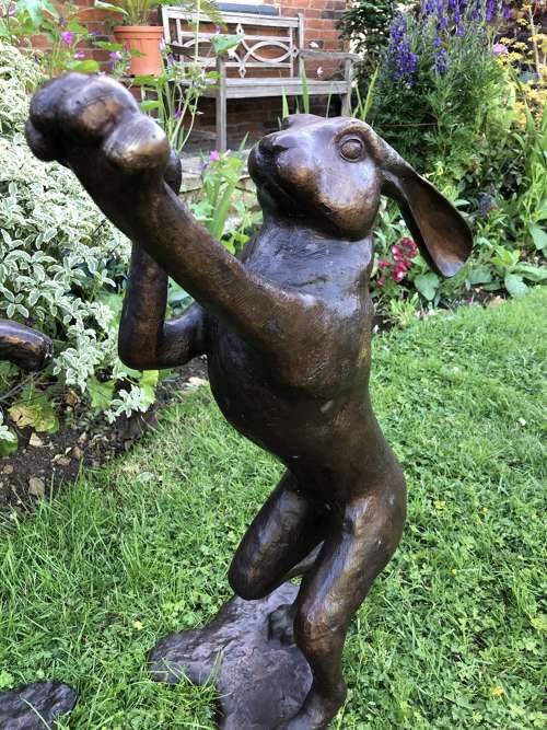 bronze rabbit garden statue