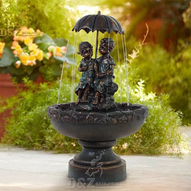 Little boy and girl outdoor umbrella water fountain