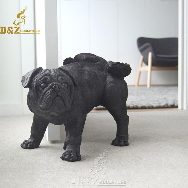 peeing pug statue