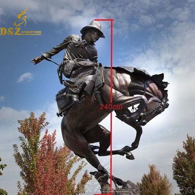 large bronze cowboy on horse statue