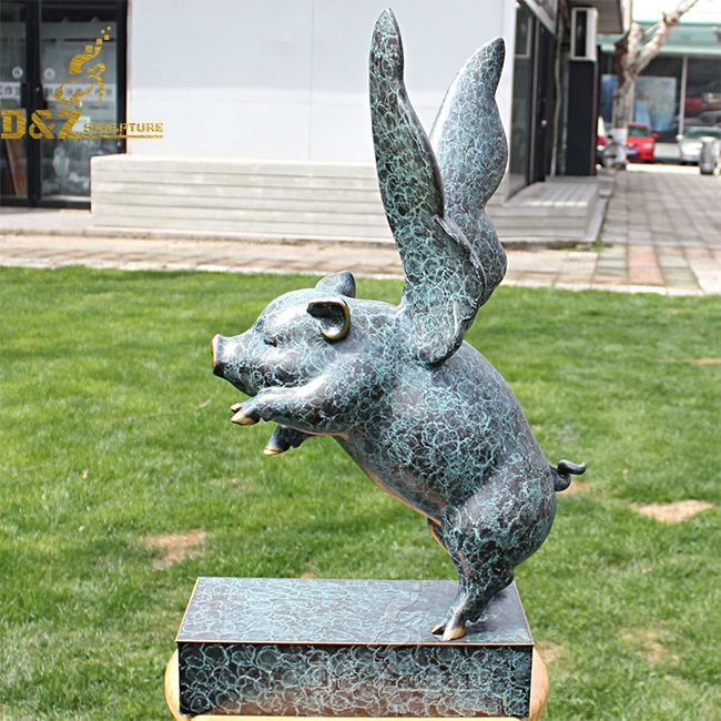 Large flying pig outdoor garden statue