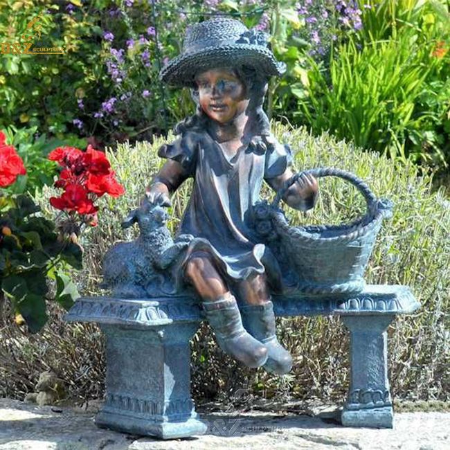 girl on bench with basket garden statue