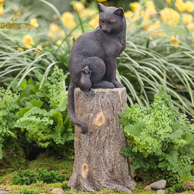 cat and mouse on stump garden statue