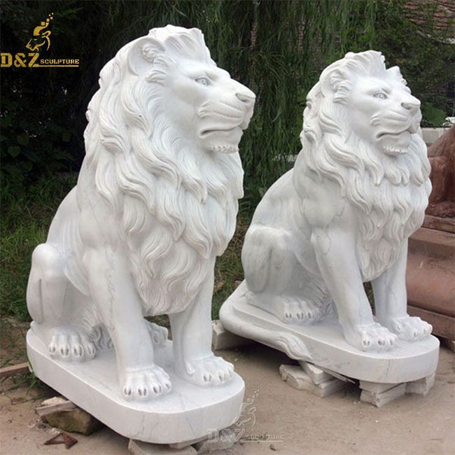 White sitting lion statue pair outside house
