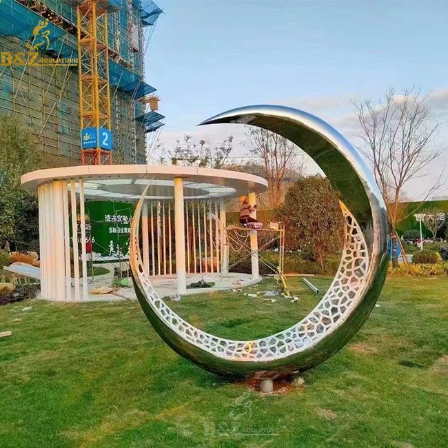 Stainless steel hollow crescent sculpture