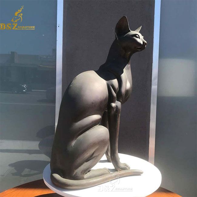 Bronze Egyptian black cat statue laying down