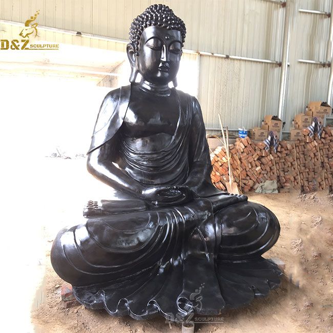 Black peaceful meditating buddha statue
