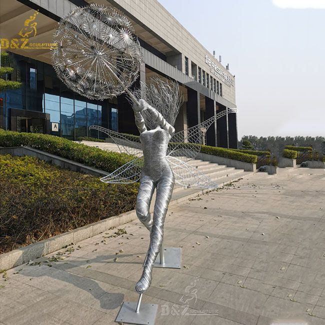 Wire fairy sculptures dancing with dandelions for sale