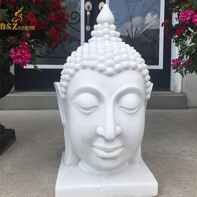 large white buddha head garden statue