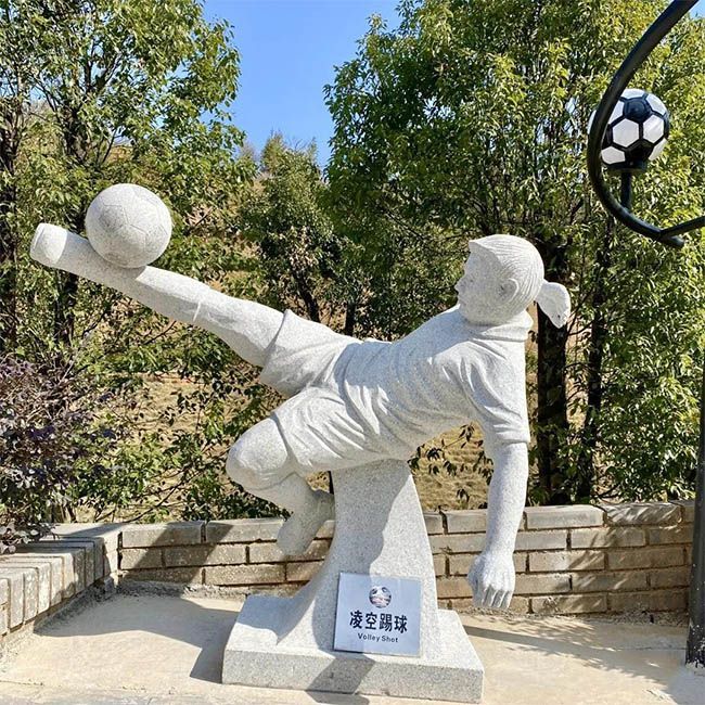 Marble soccer player statue