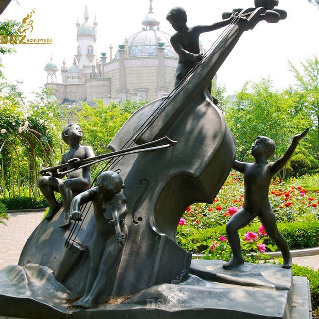 Musical instrument sculpture guitar and playing boys