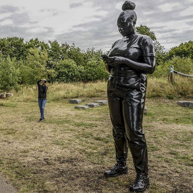 Thomas J Price Reaching Out black woman sculpture