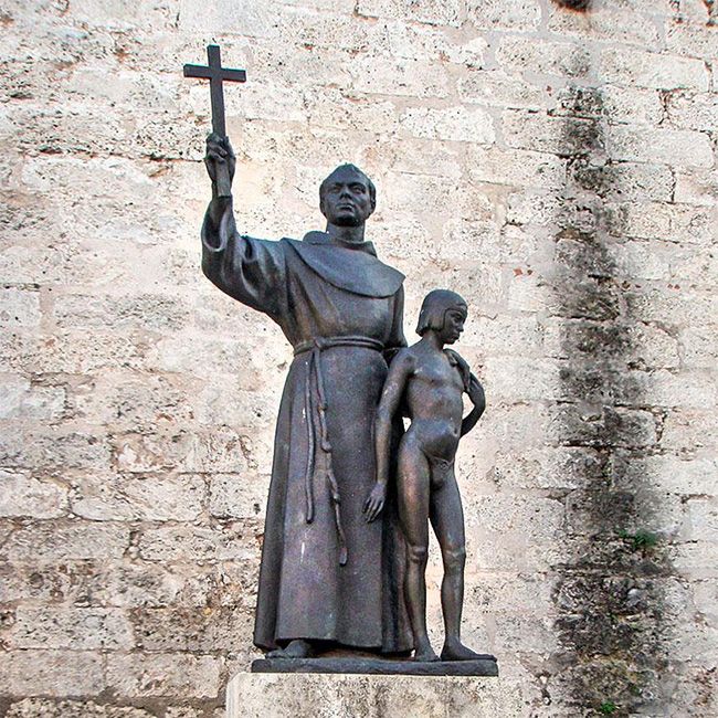 Statue of priest Fray Junipero Serra with Indian boy